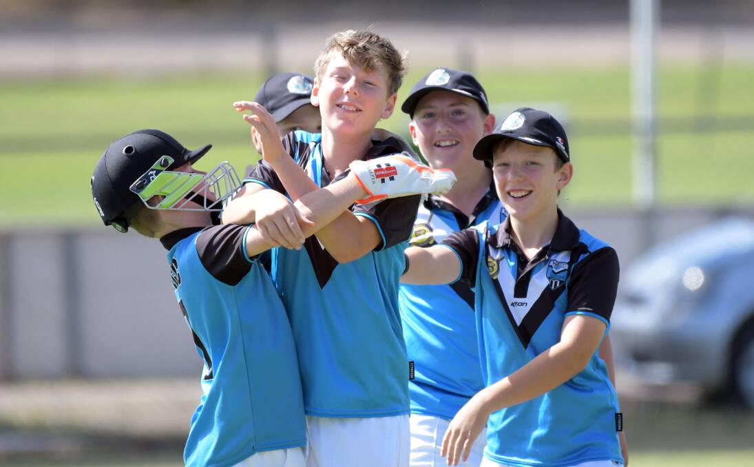 Huntly-North Epsom under-12A players celebrate a wicket against Bendigo. Picture: GLENN DANIELS