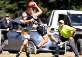 Bendigo Pioneers' defender Nick Thompson tries to stop Rebels' forward Strahan Robinson. Picture by Ballarat Courier