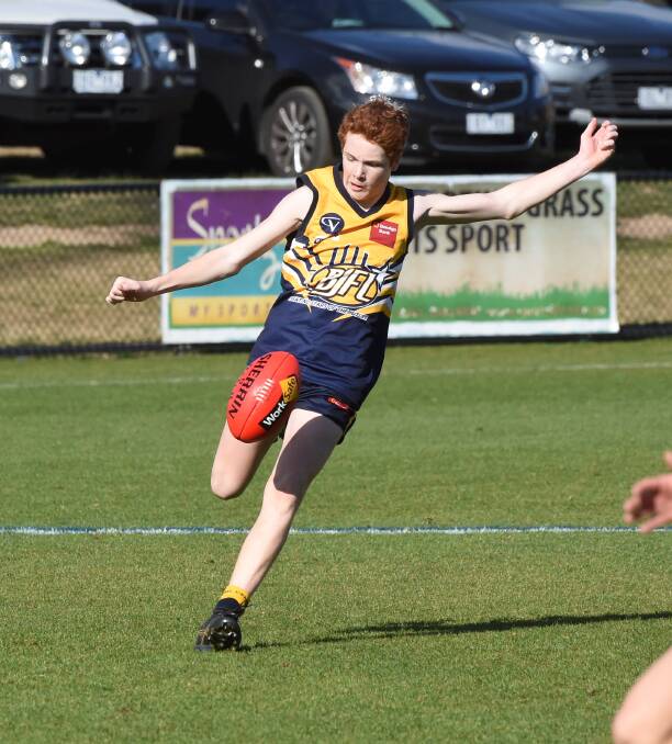 Noah Walsh in action in the under-15 game. Picture: LACHLAN BENCE