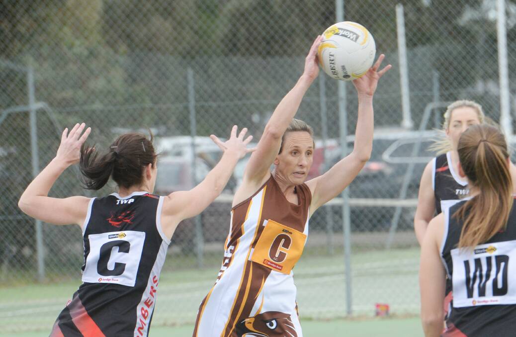 ATTACKING MOOD: Huntly centre Kym Bell looks for a pass against Leitchville-Gunbower. Picture: DARREN HOWE 