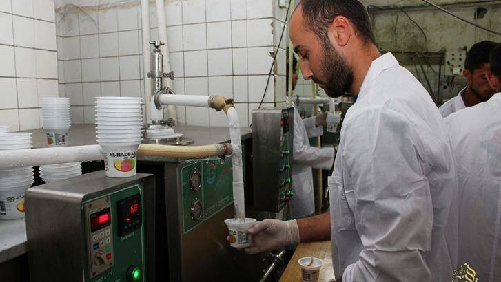 A television channel run by Islamic State  shows ice cream being manufactured in the Iraqi city of Mosul, now held by IS for more than a year.  Photo: Supplied