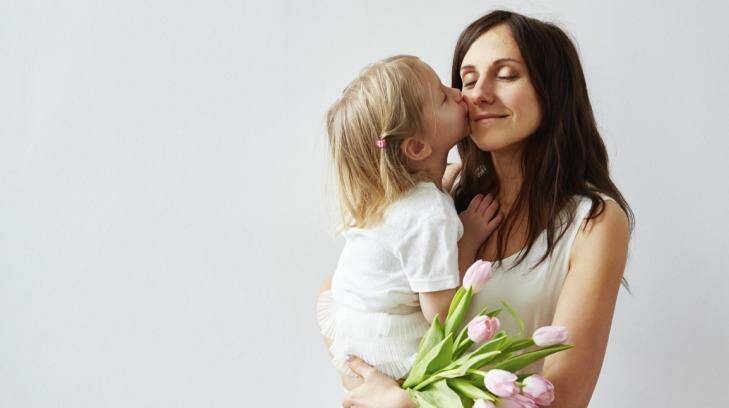 A kiss might be the best Mother's Day gift of all. Photo: iStock