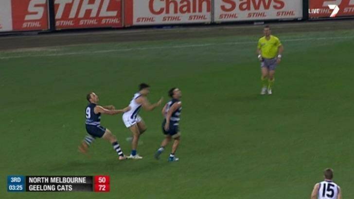 Lindsay Thomas dramatically exagerates contact in the back against Geelong's James Kelly. Photo: Channel Seven