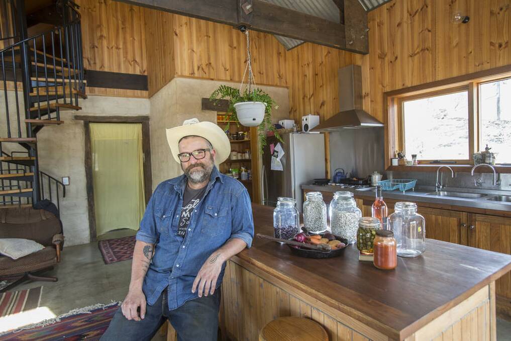 Author, farmer and blogger, Rohan Anderson, inside his home kitchen. He lives in Yandoit, near Castlemaine. Photo: Simon O'Dwyer