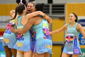 Melbourne Mavericks players celebrate their stunning come-from-behind win in Queensland. (Darren England/AAP PHOTOS)