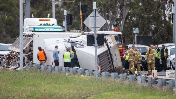 The truck rolled over at Blackburn Road on-ramp causing traffic chaos on the Monash Freeway. Photo: Jason South