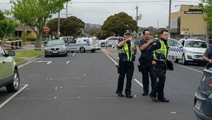 Police near the scene where a police officer opened fire on a man in Dandenong on Wednesday.  Photo: Nine News