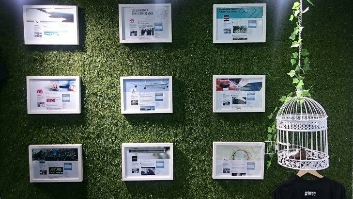 Framed company Twitter profiles line the walls. Photo: Tim Biggs