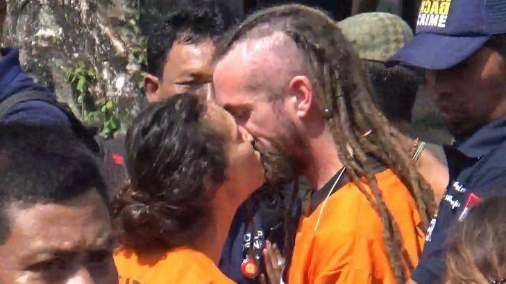 Sara Connor and David Taylor kiss in August during a police re-enactment of the events that led to the death of Wayan Sudarsa. Photo: Supplied