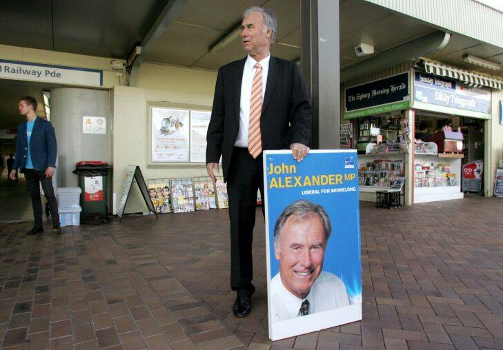 Federal member for Bennelong John Alexander with his election poster at 
Eastwood Train Station in Sydney, August 9, 2013. (SHD NEWS) Photo By 
Mick Tsikas

bMM8L8924.jpg