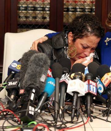 Bad experience: High-profile attorney Gloria Allred comforts one of the alleged victims of Bill Cosby at a press conference in LA. 