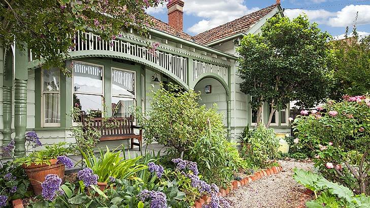 Family friendly: Near schools, public transport and cafes, this charming three-bedroom weatherboard has large rooms, beautiful gardens and off-street parking.