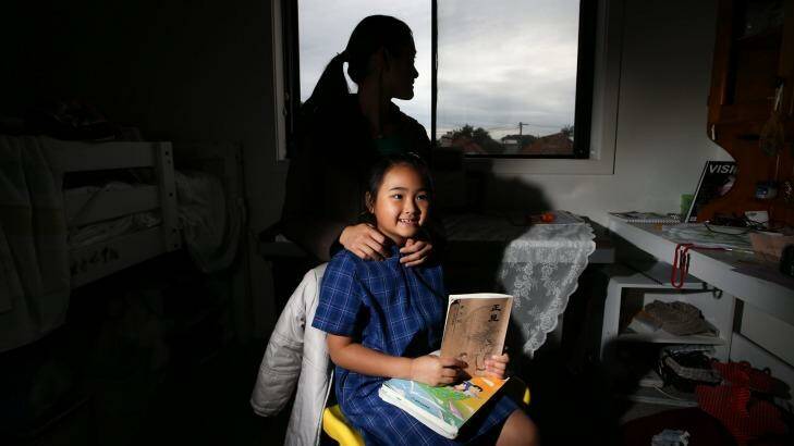 Carole Lu, pictured with her daughter Georgia, is worried about the secrecy surrounding the Chinese government's program of Confucius Classrooms in NSW schools. Photo: Peter Rae