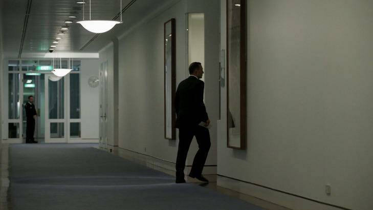 Prime Minister Tony Abbott returns to his office at 10.08pm after the press conference on Tuesday. Photo: Andrew Meares