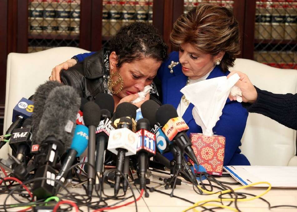Bad experience: High-profile attorney Gloria Allred comforts one of the alleged victims of Bill Cosby at a press conference in LA. 