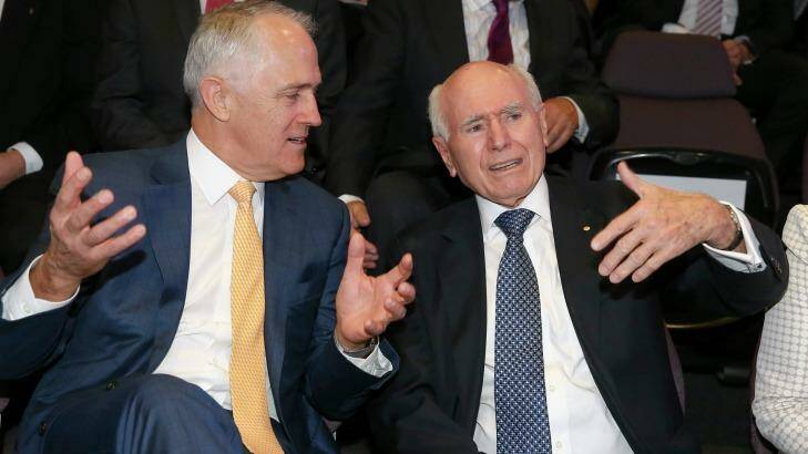 Mutual admiration: Prime Minister Malcolm Turnbull and former prime minister John Howard during the launch of the John Howard Walk of Wonder at Questacon in Canberra. Photo: Alex Ellinghausen
