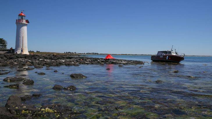 A boat allegedly used by the syndicate after it ran aground at Port Fairy Photo: Rob Gunstone