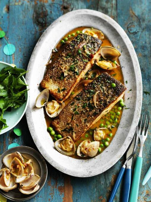 Pan-fried salmon with clam sauce. <a href="http://www.goodfood.com.au/good-food/cook/recipe/panfried-salmon-with-clam-sauce-20140203-31wg2.html"><b>(Recipe here).</b></a> Photo: William Meppem