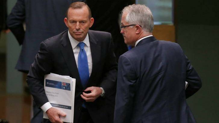 Crossing paths: Malcolm Turnbull has made some modest efforts at reconciling Tony Abbott to the new reality.  Photo: Alex Ellinghausen