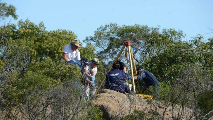 Police retrieve Wayne Amey's body from its hiding place on Mount Korong in December 2013. Photo: Jim Aldersey