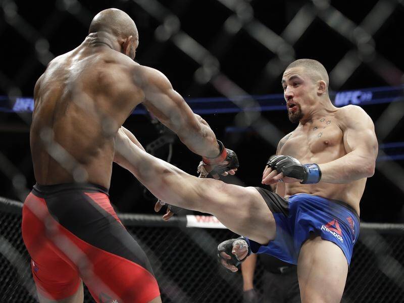 Rob Whittaker says his first title defence against Yoel Romero will be an "absolute nightmare".