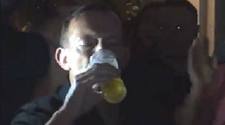 Thirst quencher: Tony Abbott finished a beer in 10 seconds on Saturday night.