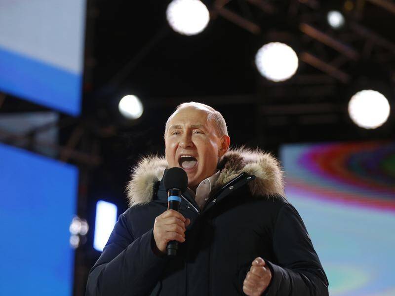 Vladimir Putin has thanked Russian voters for re-electing him to another term as president.