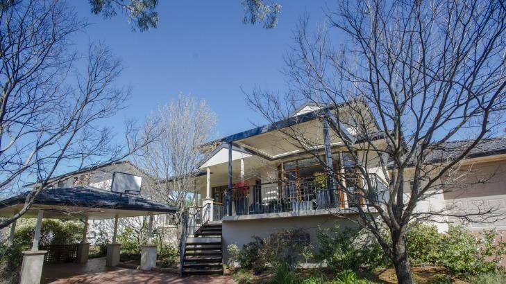 This home in Curtin was auctioned on Saturday morning. Photo: Jamila Toderas