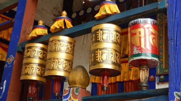 Spinning a prayer wheel helps accumulate wisdom and good karma in Bhutan??  Nick Abrahams
