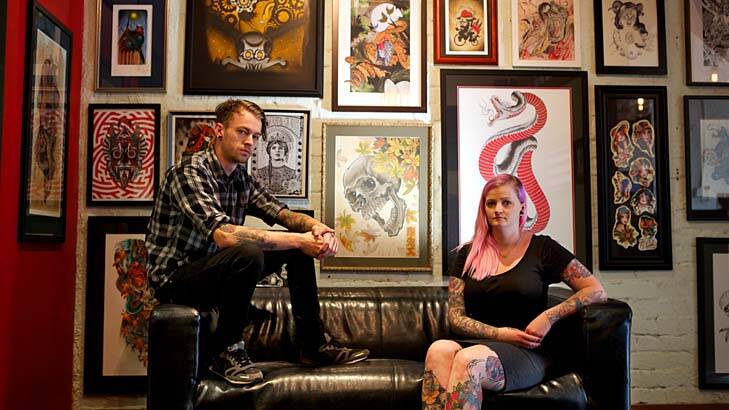 Making a point: Artists Nicole Draeger and Hal Cheshire of Green Lotus Tattoo Studio. Photo: Jason South