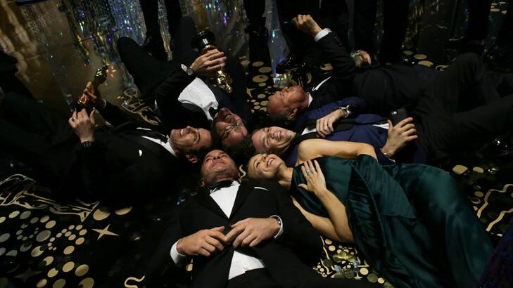 The cast of Spotlight celebrate after the movie won the award for best picture.