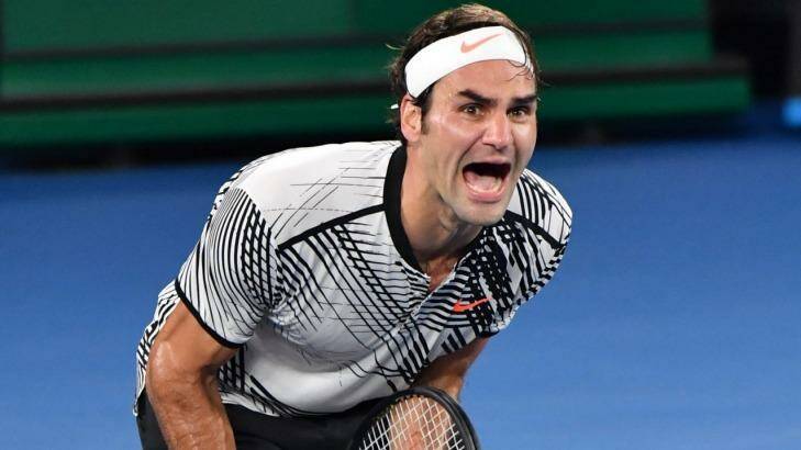 Roger Federer celebrates after beating Rafael Nadal. Photo: Joe Armao, Fairfax Media.