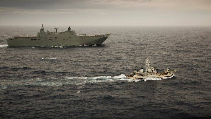 HMAS Adelaide escorts the former Japanese whaling vessel towards Hobart in December. Photo: LSIS Sarah Williams