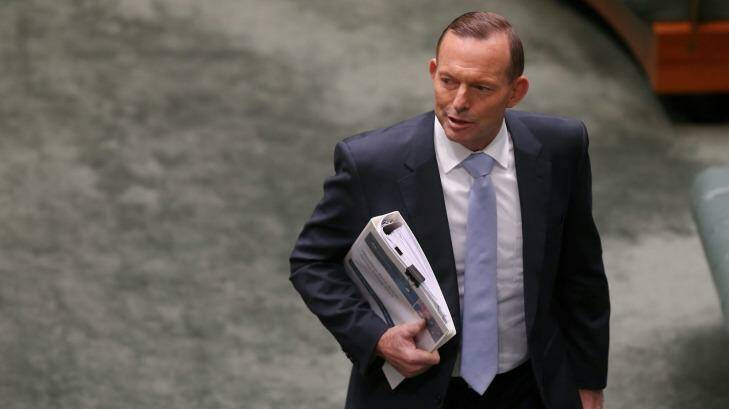 Prime Minister Tony Abbott arrives for Question Time. Photo: Alex Ellinghausen