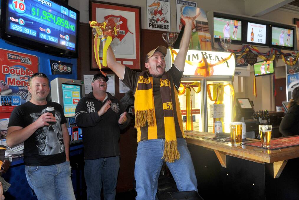 AFL Grand Final Day celebrations in Bendigo.
Hawthorn  supporters at the Hibernian Hotel, Golden Square.
Andy Muir gets excited when Hawthorn goals.

Picture: Julie Hough 28.09.13
