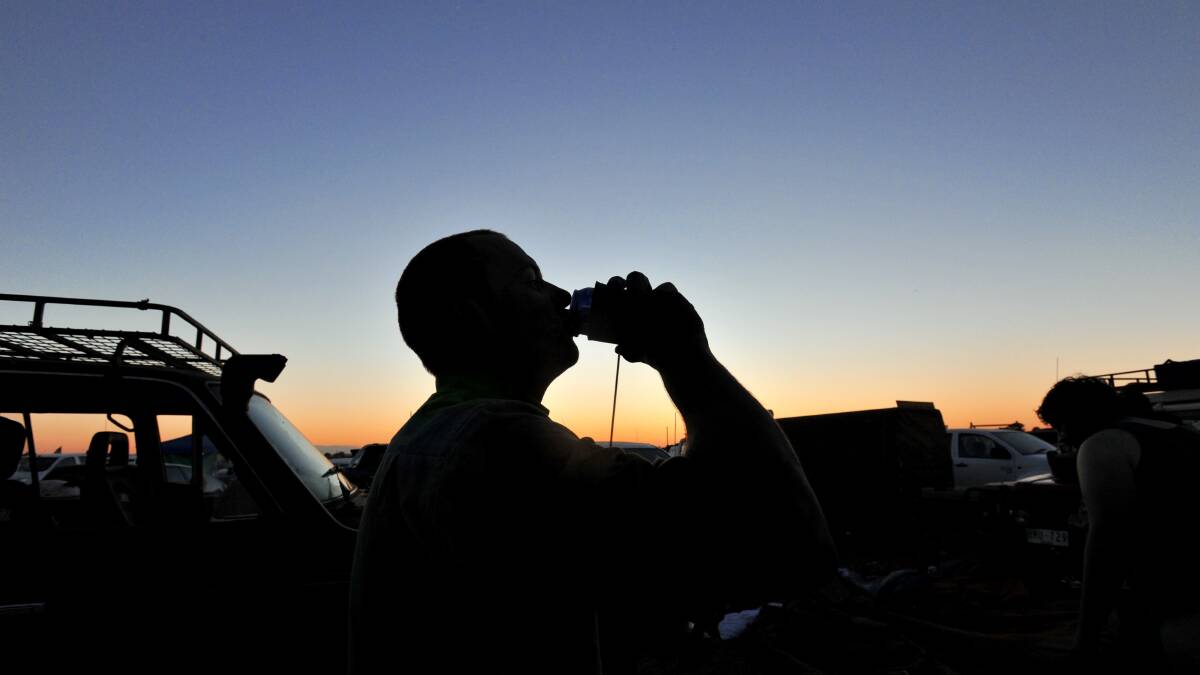 Dan Maher enjoys an early morning drink.

Picture: JIM ALDERSEY