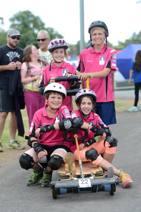 Kingsley Park primary students Cody Robertson and Abbey Tanner get a push from Jessica Gardiner and Lachlan Fry during the RACV Energy Breakthrough in Maryborough.

Picture: JIM ALDERSEY