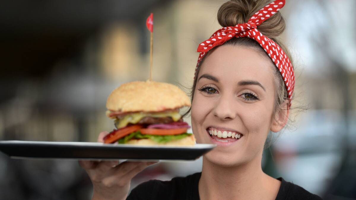 Grill'd team member Taegan Brown with the soon to be renamed Allmighty Burger. Grill'd Bendigo is celebrating 3 years in town by asking the people of Bendigo to rename the burger.

Picture: Jim Aldersey
200813