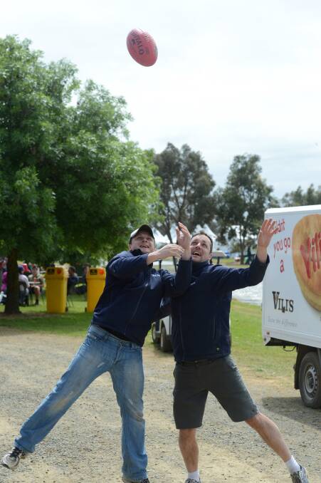 Ben McDonnell and Josh Farmer from Vili's Pies enjoy a lunch time break at day two of the Elmore Field Days.

Picture: JIM ALDERSEY