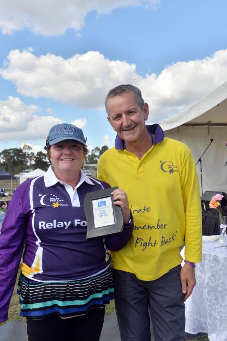 Award for Best Candlebag display Heather Slater of Caring Carers,  Rob Kean, Chairman of Bendigo RFL Committee
Picture: BRENDAN McCARTHY