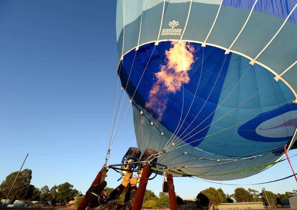 The crew inflate the balloon. 

Picture: JODIE DONNELLAN 