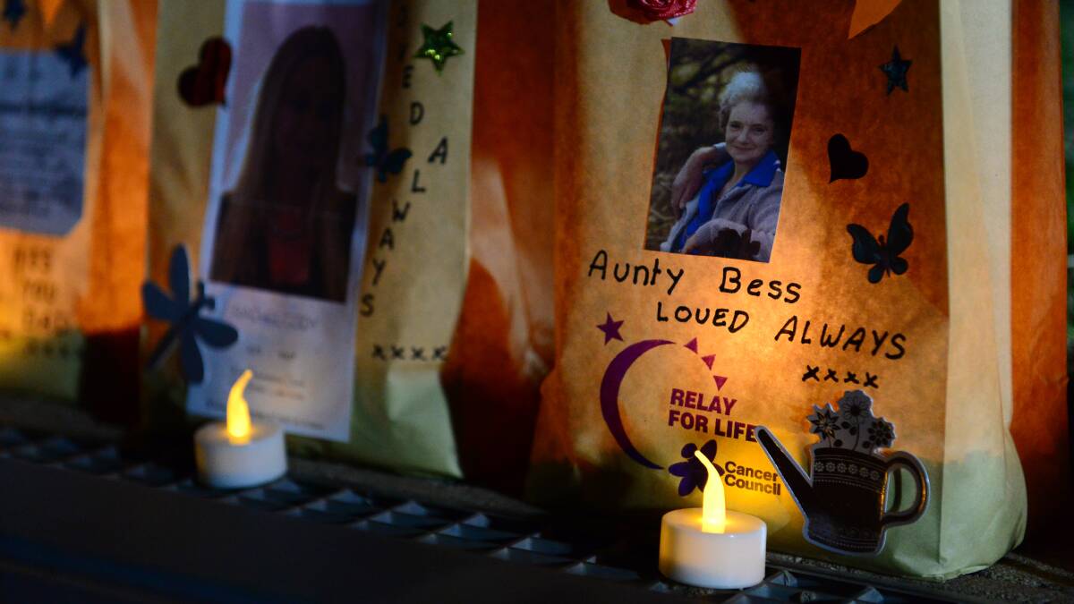 Messages are left on bags and candles placed inside for lost loved ones.

Picture: JIM ALDERSEY