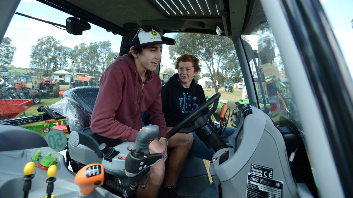 Ben Diery and Daniel Maher check out the cab in a new tractor at day 1 of the Elmore Field Days.

Picture: JIM ALDERSEY
