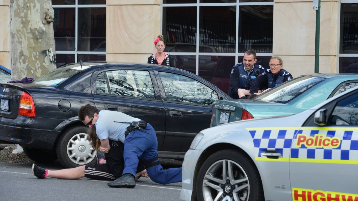 3 people were arrested after a 2 knifes where produced in Centrelink.

Picture: Jim Aldersey
230813