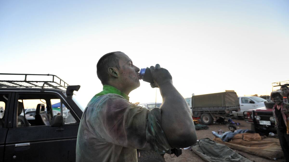 Dan Maher enjoys an early morning drink.

Picture: JIM ALDERSEY