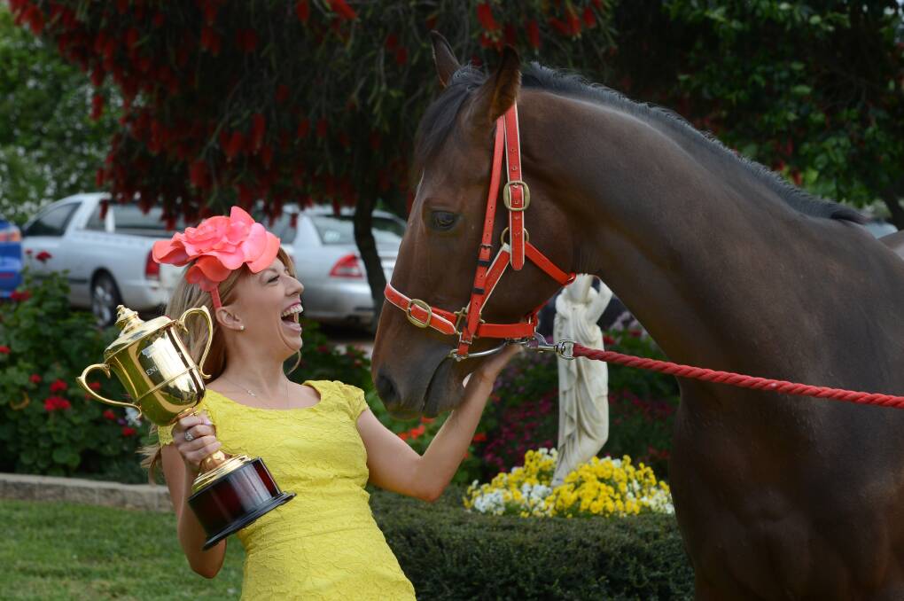 Stacey Lonsdale, dressed by Myer, with Churchill Express and the Bendigo Cup.

Picture: JIM ALDERSEY
291013