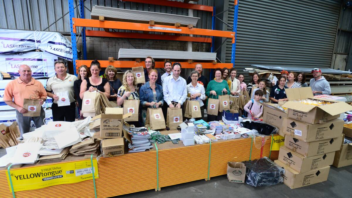 HALT donors packing showbags for Tradies.


Picture: JIM ALDERSEY