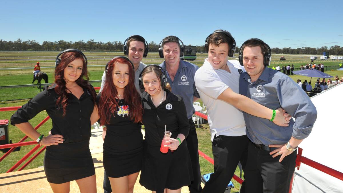 Ash Matheson, Shane Armstrong, Murdoch Hill and Mark Ditchfield with Keishia Bovell, Casey Marin and Tiarna Armstrong from Modish entertainment at the 2013 Bendigo Cup.

Picture: JIM ALDERSEY