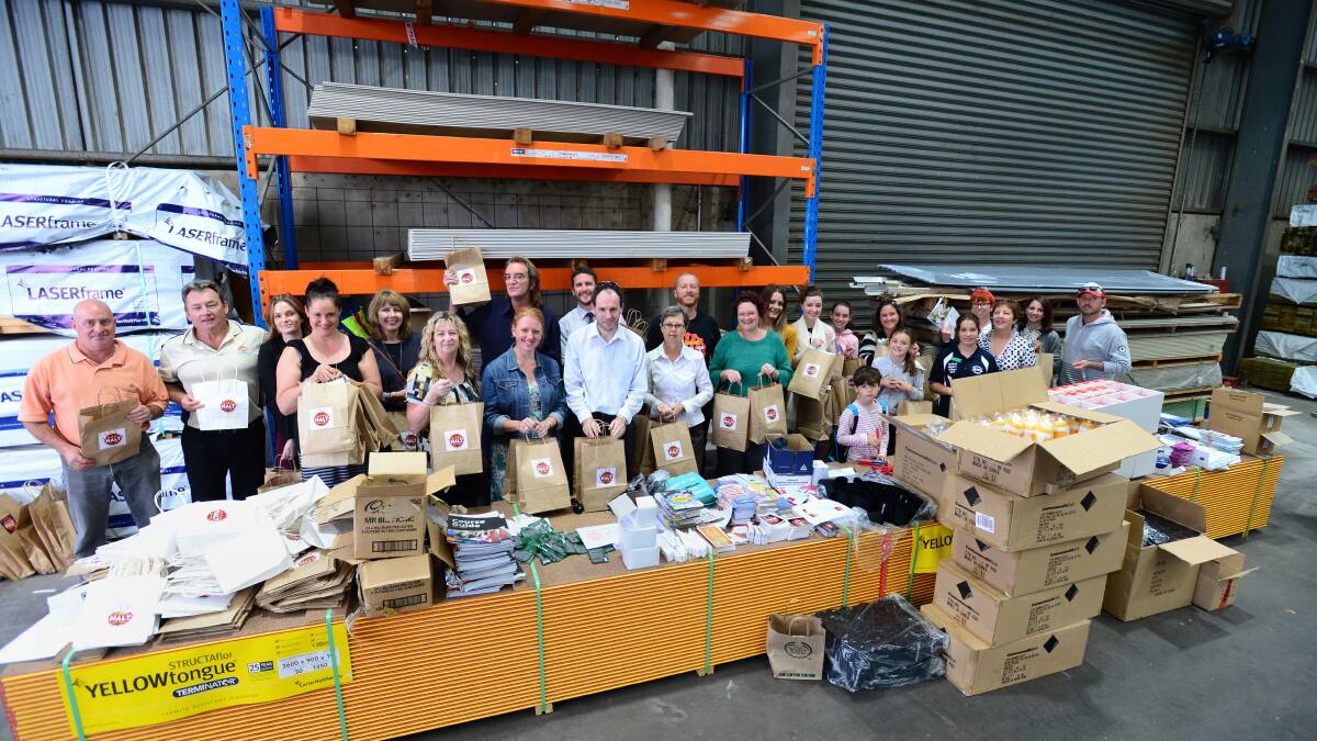 HALT donors packing showbags for Tradies.


Picture: JIM ALDERSEY