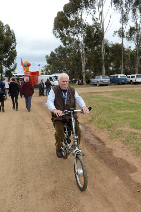 Murk Schoen rides his electric folding bike at day two of the Elmore Field Days.

Picture: JIM ALDERSEY